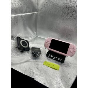 pink psp 3000 w/accessories & new battery & battery pack